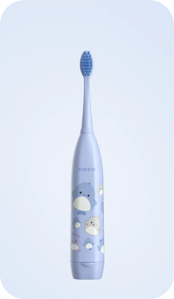 Ordo electric toothbrush in purple with cute cartoon whale and sea creature designs, likely a kids' model.