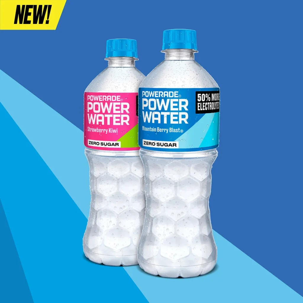 Powerade Power Water bottles showing zero sugar electrolyte water with 50 percent more electrolytes in Strawberry Kiwi and Mountain Berry Blast flavors